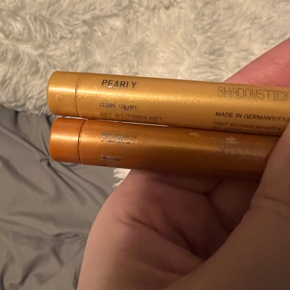 Aboutface beauty shadow stick. 2 pc. Orange and yellow. Lightly used. HALSEY